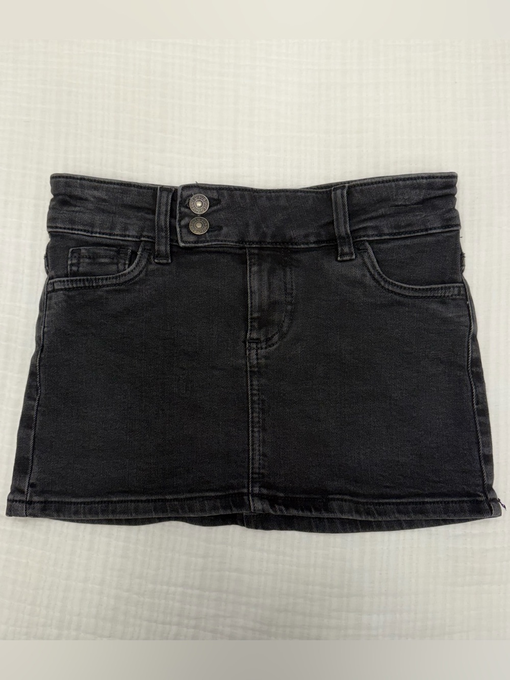 subdued washed black denim mini skirt